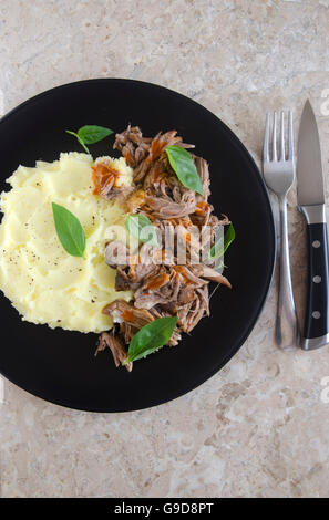 Pulled pork with mashed potatoes Stock Photo