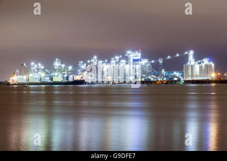 Refinery illuminated at night Stock Photo