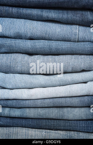 Jeans trousers stack closeup Stock Photo