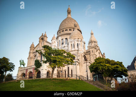 Sacre-Coeur Basilica early in the morning at first sunlight .