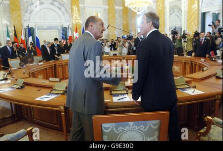 Britain's Prime Minister Tony Blair chats with French President Jacques Chirac at the J8 (Junior G8) session of the G8 Summit in St. Petersburg, Russia. Stock Photo