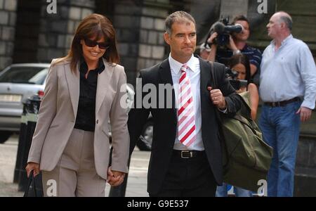 Former Scottish Socialist Party leader Tommy Sheridan leaves the Court of Session in Edinburgh with his wife Gail. Stock Photo