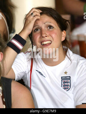 England fans reaction in the Symphony Bar in Liverpool, during the penalty shoot out between England and Portugal in the Fifa World Cup 2006 Semi-final match between England and Portugal. Stock Photo