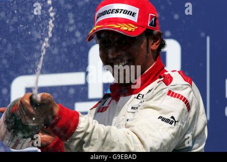 Race winner Lewis Hamilton (GBR) celebrates on the podium ... Motor Racing - Lewis Hamilton Feature ... 13-06-2006 ... Nurburgring ... Germany ... Photo Credit should read: NULL/Unique Reference No. 3618294 ... NULL Stock Photo