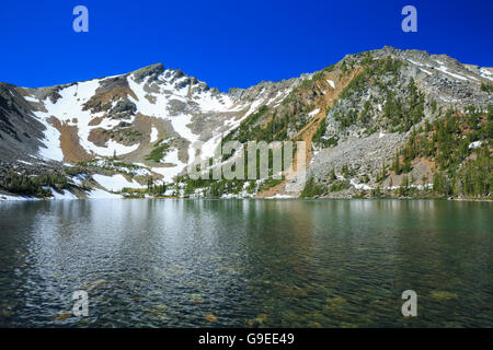 lake louise tobacco roots louise lake below middle mountain in the tobacco root mountains near  mammoth, montana Stock Photo