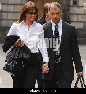 Tommy Sheridan leaves the Court of Session in Edinburgh with his wife Gail. Stock Photo