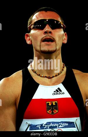 Sydney 2000 Olympics - Athletics - Men's 400m Hurdles. Germany's Thomas Goller Stock Photo