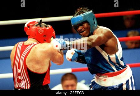 Sydney 2000 Olympics - Boxing - Men's 91KG plus. Great Britain's Audley Harrison on his way to victory against italy's Paolo Vidoz Stock Photo