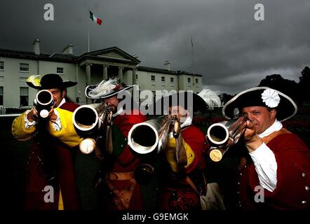 Muskeeters from a historial re-enactment group representing soldiers from the Williamite and Jacobite Armies on the lawn of the Aras where Ireland's President Mary McAleese and her husband Dr Martin McAleese host a July 12th reception and garden party at Aras An Uachtarain to mark the anniversary of the Battle of the Boyne. Stock Photo