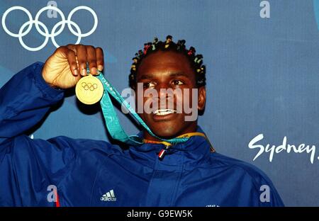 Sydney 2000 Olympics - Boxing - Men's 91kg plus - Final. Great Britain's Audley Harrison celebrates with his Gold medal Stock Photo