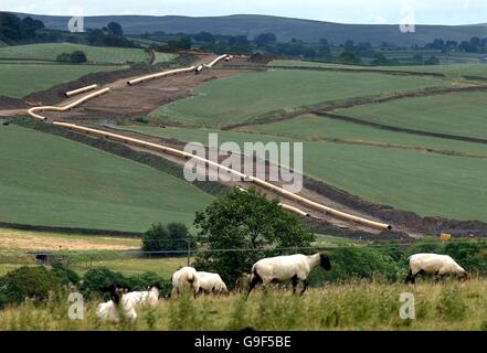 General view of the construction of a new underground gas supply pipeline winding its way across the Dales landscape around Skipton, Yorkshire. Stock Photo