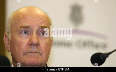 Home Secretary John Reid speaks during a press conference at the Central Hall, in Westminister. Stock Photo