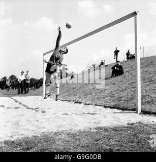 West Ham United goalkeeper Lawrie Leslie tips a shot over the bar Stock Photo