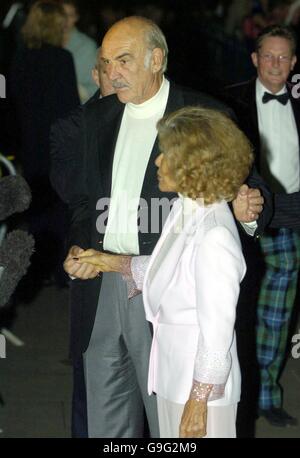 Sir Sean Connery arrives with his wife Micheline at the National Gallery for a party to help celebrate the 60th anniversary of the Edinburgh International Film Festival. Stock Photo