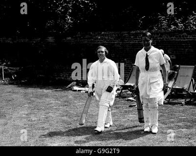 Cricket - Kent v Middlesex - Chiswick House. Action from the first women's county cricket match. Miss Archdale (r) and Miss Dann (l) going out to open Kent's innings Stock Photo