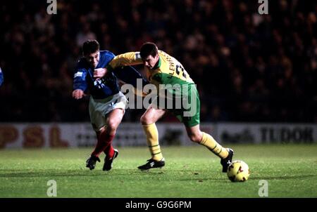 Soccer - Nationwide League Division One - Portsmouth v Norwich City. Norwich City's Chris Llewellyn (r) pushes Portsmouth's Michael Panopoulos (l) away from trying to get the ball Stock Photo