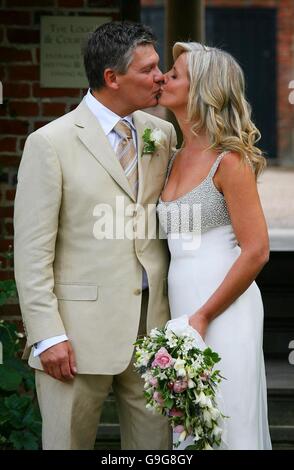 Caron Keating's widowed husband remarries. Russ Lindsay and Sally Meen after being married at the Great Fosters Hotel in Egham, Surrey, today. Stock Photo