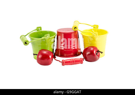 Colorful buckets with fresh fruit isolated over white Stock Photo - Alamy