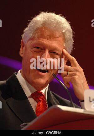Former US President, Bill Clinton speaks at the conference. Stock Photo