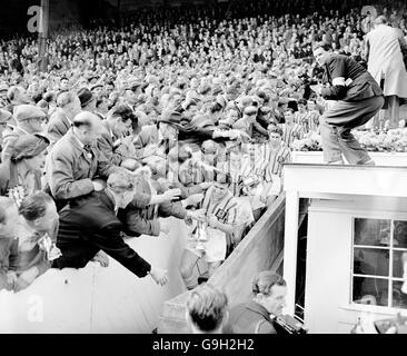 Aston Villa captain Johnny Dixon leads his team down the steps after collecting the FA Cup. Stock Photo