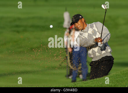 USA's Tiger Woods chips out of a bunker on the fourth hole during Day One of the Ryder Cup at the K-Club, Co Kildare, Ireland. Picture date: Friday September 22, 2006. Match One, Fourballs: USA's Tiger Woods and Jim Furyk v Europe's Padraig Harrington and Colin Montgomerie. Photo Credit should read: Rui Vieira/PA Stock Photo