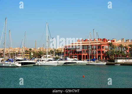 Yachts and boats in the marina with buildings to the rear, Puerto Sotogrande, Cadiz Province, Andalusia, Spain, Western Europe. Stock Photo