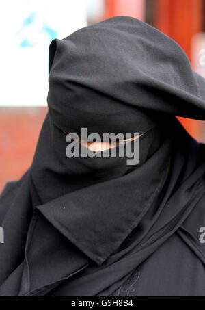 A Muslim woman out doing her shopping in Blackburn wearing the Niqab ...