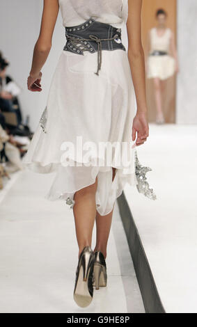 A model wears a design from Bora Aksu during the Spring/Summer 2007 London Fashion Week collections, at the BFC tent outside the Natural History Museum, west London. Stock Photo