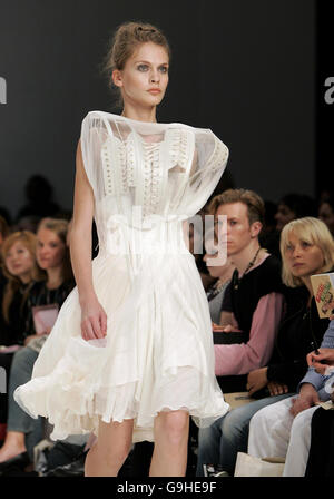 A model wears a design from Bora Aksu during the Spring/Summer 2007 London Fashion Week collections, at the BFC tent outside the Natural History Museum, west London. Stock Photo