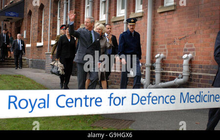 The Prince of Wales and Duchess of Cornwall leave the Royal Centre for Defence Medicine at Selly Oak Hospital, Birmingham. Stock Photo