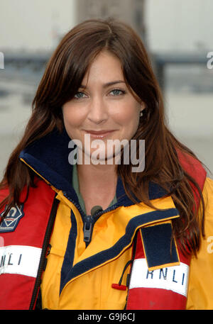 Lisa Snowdon during a photocall for his new film, The Guardian, from HMS President, east London. Picture date: Wednesday 11 October 2006. Lisa was taking part in a staged Air Sea Rescue to publicise the film, which stars US actor Ashton Kutcher as a US Coastguard. Photo credit should read: Ian West/PA Stock Photo