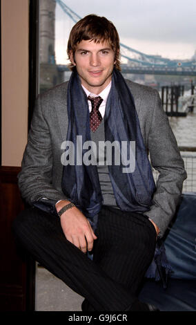 Ashton Kutcher during a photocall for his new film, The Guardian, from HMS President, east London. Picture date: Wednesday 11 October 2006. Lisa was taking part in a staged Air Sea Rescue to publicise the film, which stars US actor Ashton Kutcher as a US Coastguard. Photo credit should read: Ian West/PA Stock Photo