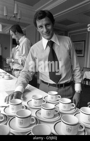 New Arsenal manager Terry Neill contemplates the challenge awaiting him over several cups of tea. Stock Photo