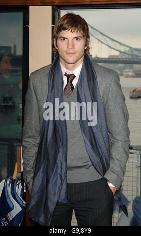 Ashton Kutcher - The Guardian photocall - London. Ashton Kutcher during a photocall for his new film, The Guardian, from HMS President, east London. Stock Photo