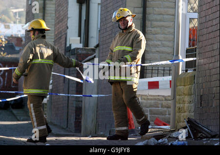 Emergency services attend the scene in Accrington where a house fire has claimed the lives of five members of the same family. Stock Photo