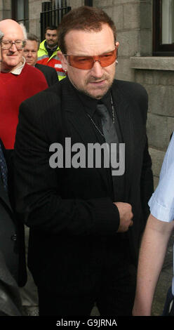 U2 in High Court for Stetson hat appeal Stock Photo