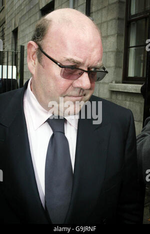 U2 manager Paul McGuinness leaves the High Court in Dublin, after band's frontman Bono gave evidence at an appeal launched by the bands former stylist to keep the Stetson hat she claims the band gave her. Stock Photo