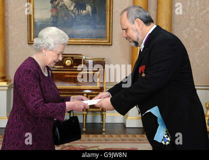 Britain's Queen Elizabeth II receives the Ambassador of Belgium Mr Jean-Michel Veranneman at Buckingham Palace, London. Stock Photo