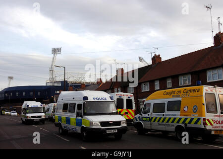 Police vehicles line the streets prior to the match bewteen West Bromwich Albion and Wolverhampton Wanderers at the Hawthorns Stock Photo