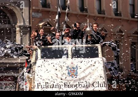 Fulham's Owner Mohamed Al Fayed heads the celebrations as Jean Tigana's team enjoy promotion to the Premier League . Stock Photo