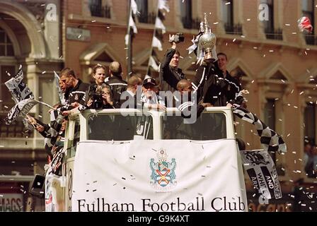 Fulham's Owner Mohamed Al Fayed heads the celebrations as Jean Tigana's team enjoy promotion to the Premier League . Stock Photo