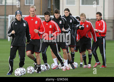 Soccer - Liverpool Training session - Melwood. Liverpool's Craig Bellamy (left) leads his team mates during a training session at Melwood, Liverpool. Stock Photo