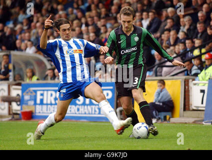Kilmarnock's Danny Invincibile and Celtic's Lee Naylor during the Bank of Scotland Premier League match at Rugby Park, Kilmarnock. Stock Photo