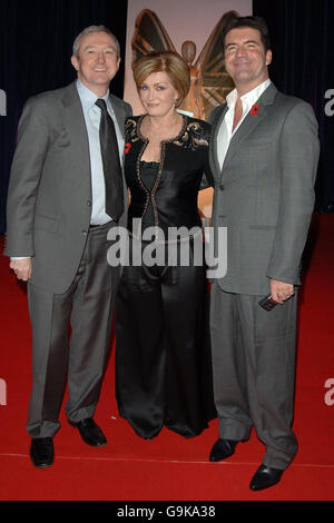 (from left to right) Louis Walsh, Sharon Osbourne and Simon Cowell arrive for the Daily Mirror Pride of Britain Awards at London Television Studios in central London. Stock Photo