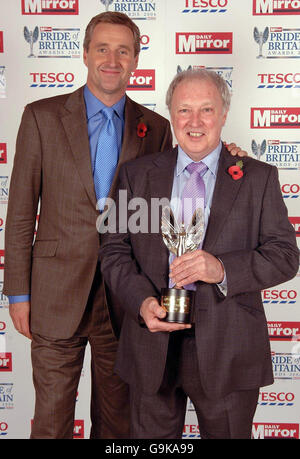 Alan Forrester, 59, from Aberystwyth, wins an Outstanding Bravery Award presented by Mark Austin at the Daily Mirror Pride of Britain Awards at London Television Studios in central London. Stock Photo