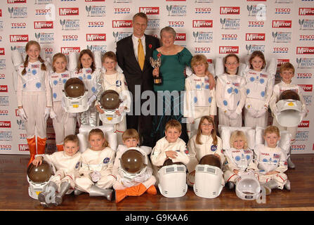 Linda Davies, 52, headteacher of Wiltshire's Neston primary School stands with astronaut Piers Seller, who presented her with the Teacher of the Year Award at the Daily Mirror Pride of Britain Awards at London Television Studios in central London. Stock Photo