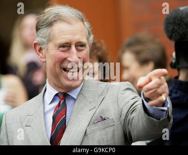 The Prince of Wales points during his visit to the Engine House Community Project in Dowlais, Merthyr Tydfil, where he viewed activities carried out at the centre. Stock Photo