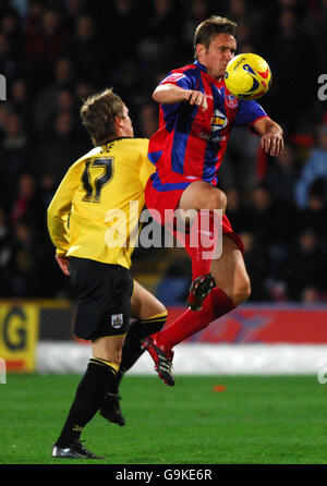 Crystal Palace's Danny Granville (right) and Barnsley's Nicky Wroe battle for the ball during the Coca-Cola Championship match at Selhurst Park, London. Stock Photo