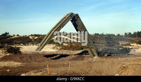 The Army's new heavily armoured engineer tank Titan builds a bridge at Bovington Military Training Area in Dorset. Stock Photo