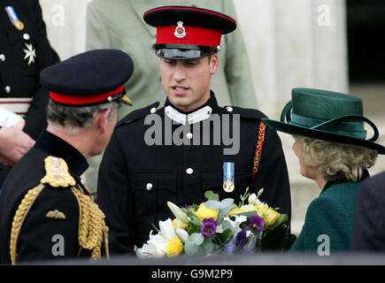 Prince William bids farewell to his father, the Prince of Wales, and his stepmother, the Duchess of Cornwall, after the Sovereign's Parade at the Royal Military Academy, Sandhurst. Stock Photo